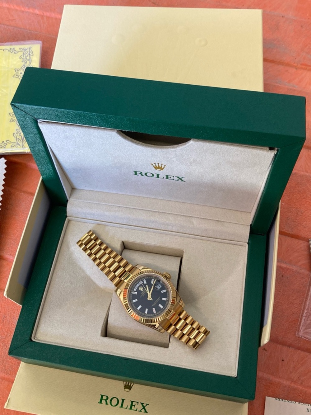 Rolex Gold Watch with Black Dial and Gold Bracelet